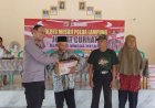 Polres Mesuji Bagikan 25 Paket Bantuan di Desa Budi Aji